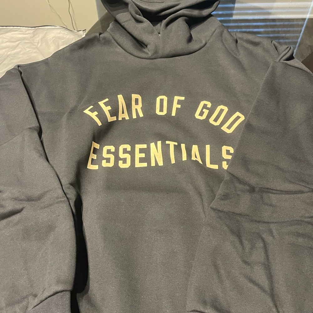 Fear of God Essentials Black Fleece Hoodie - Picture 8 of 9